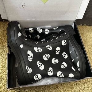 Torrid Black Skull Combat Rainboot. NWT in box. Size 11 Women’s